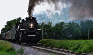 Steam locomotive pullsexcursion train through Avalon