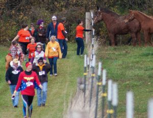 SUBMITTED PHOTO - The Clinton Topper A 5K Fun Run/Walk to benefit the special needs clients of SMILES (Special Methods in Learning Equine Skills, Inc.) is scheduled for Saturday, Oct. 22, at the SMILES facility in Darien. 