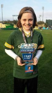 Makenna Schooff wins first place in Punt, Pass, Kick