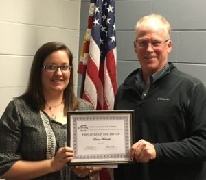 Ken Luety presents Employee of the Month Award to Laura Benisch