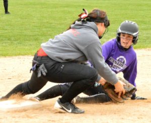 Lady Cardinals split doubleheader