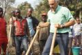 SUBMITTED PHOTO The Independent-Register
Tony Ends works soil with a broad fork in a market garden of a village in Guinea, West Africa, earlier this year, while serving a second time with the Peace Corps as a UN field officer with the World Food Programme.