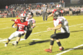 BECKY MALKOW PHOTO Brodhead Independent-Register
Nick Naramore absorbs a big hit as he delivers a pass down field.