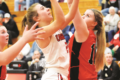 MANDY FIELDS PHOTO The Independent-Register
Zoe Tresemer slips in between defenders to get the shot up the middle.