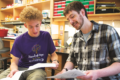 ROBIN DAVIES PHOTO Independent Register
Evan Glasgow of Brodhead shown on the right and mentoring a student received the 2019 Denton Award for Graduate Student Excellence in Teaching and Mentoring