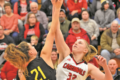 MANDY FIELDS PHOTO Independent Register
Lady Cards v. East Troy
	Abbie Dix gets up for the tip off as the Lady Cards get back to conference play after the winter break.