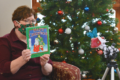 MARY HOOKHAM The Independent-Register
Albertson Memorial Library Director Carolyn Seaver reads “Max's Christmas” by Rosemary Wells for a recent storytime recording. Because of the pandemic, Storytime is posted weekly on the Albany library’s Facebook page instead of being held in person.